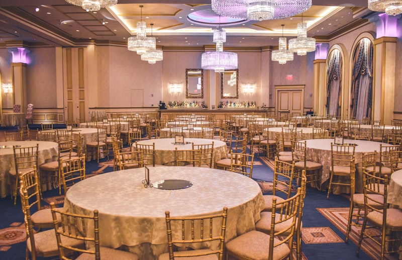 Elegant reception setup in The Prairie Hall with floor-to-ceiling windows
