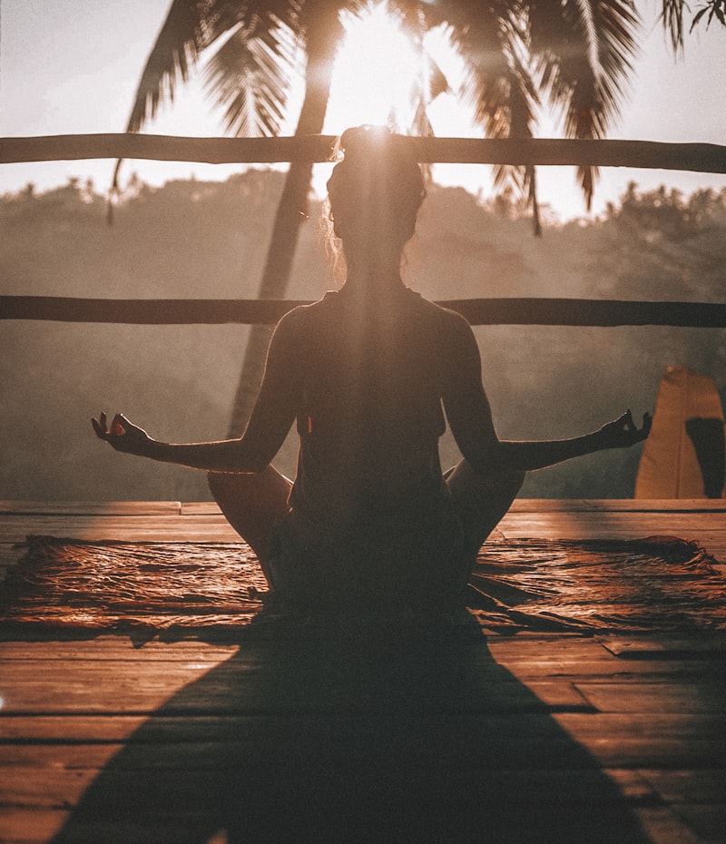 Sunrise yoga on the open prairie with golden light