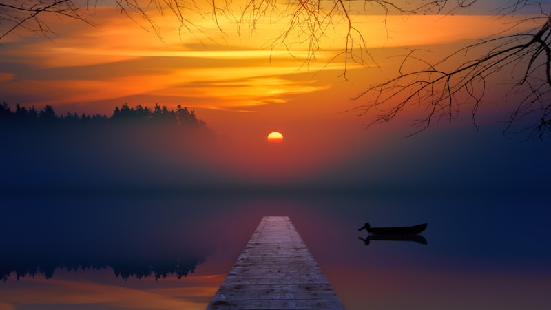 Sunset painting the prairie sky in shades of amber and gold